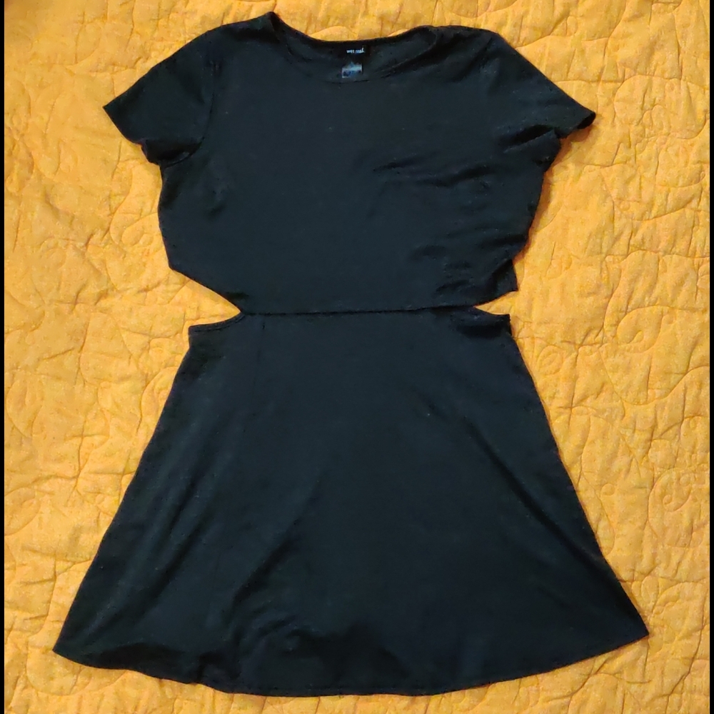 Skater dress with playful side cutouts.